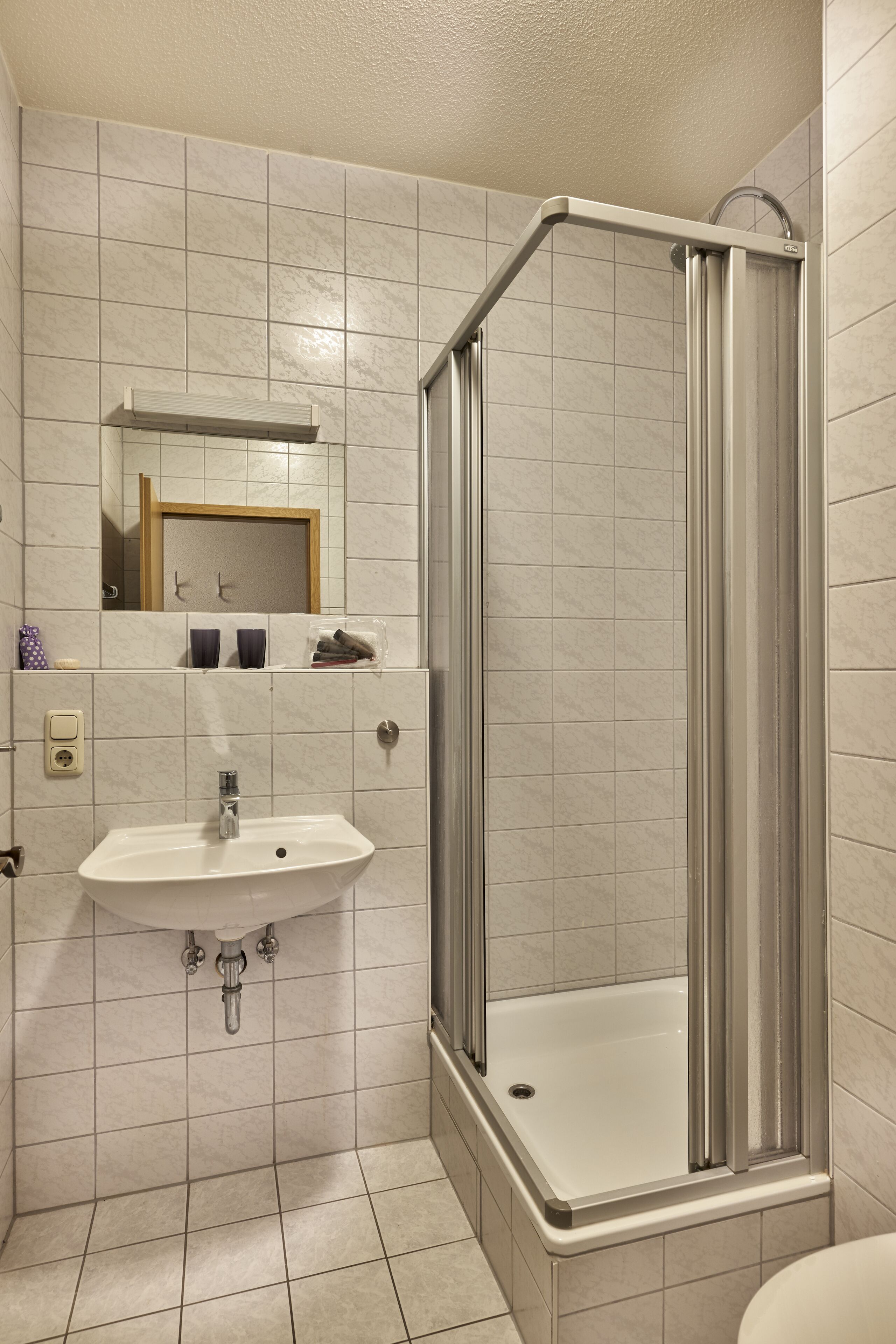 Gratis toiletartikelen, een haardroger, handdoeken, zeep