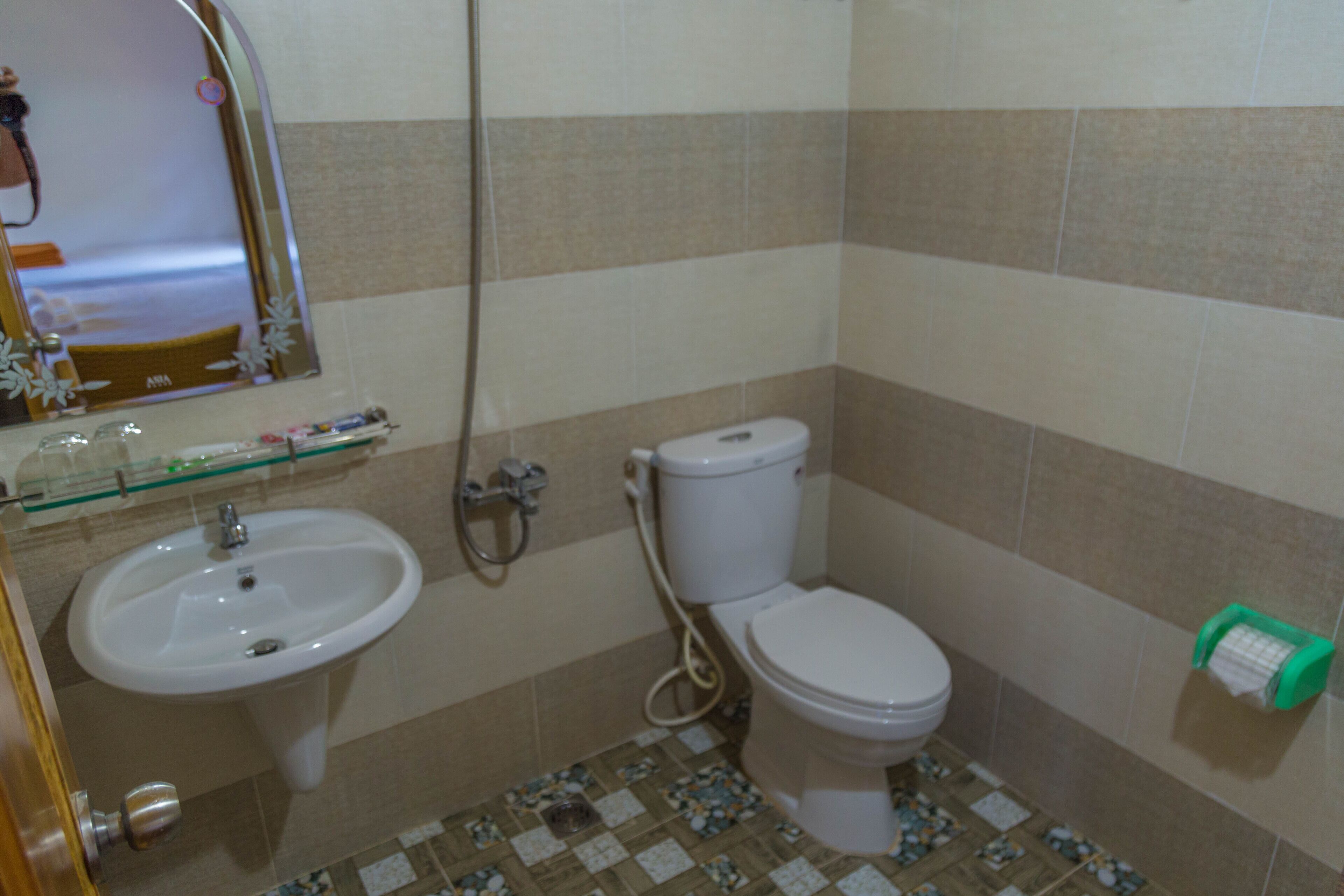 comfort room, multiple beds, pool view | bathroom | shower, designer toiletries, slippers, towels