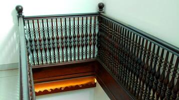 A wooden staircase with a balustrade.