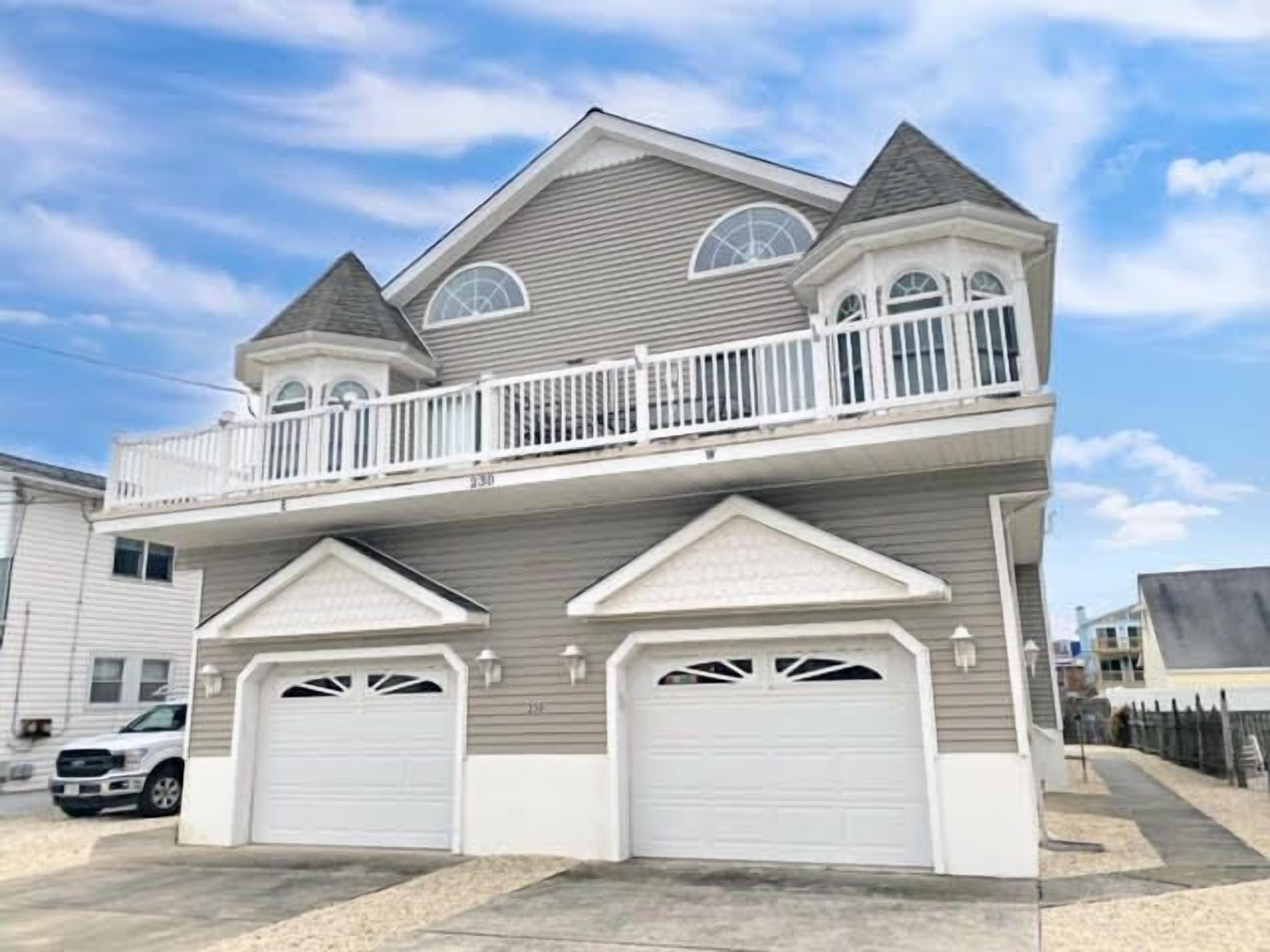 JUST A FEW BLOCKS from the beach, and has views of the bay from the deck.