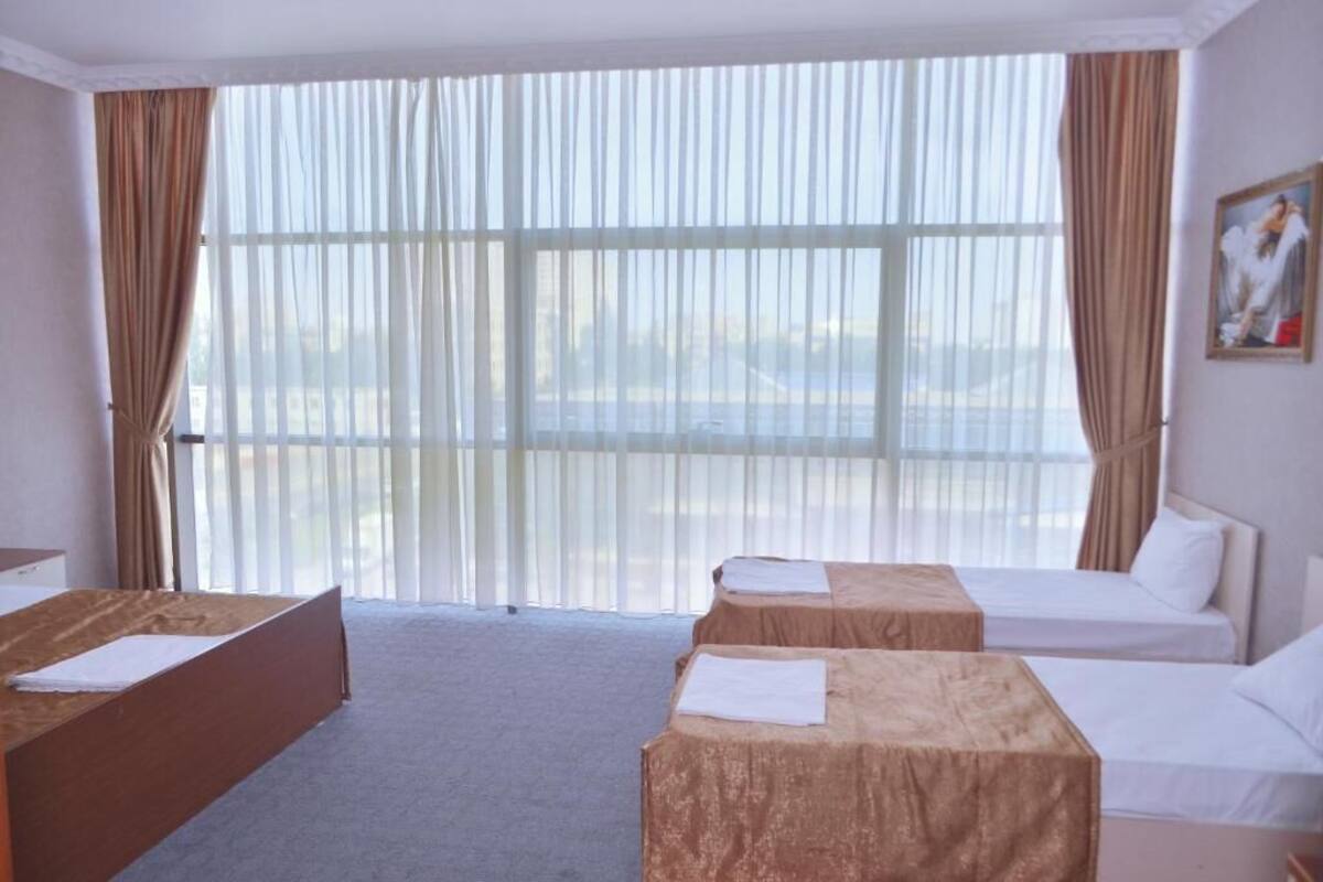 Classic Quadruple Room | 1 bedroom, minibar, free WiFi, bed sheets