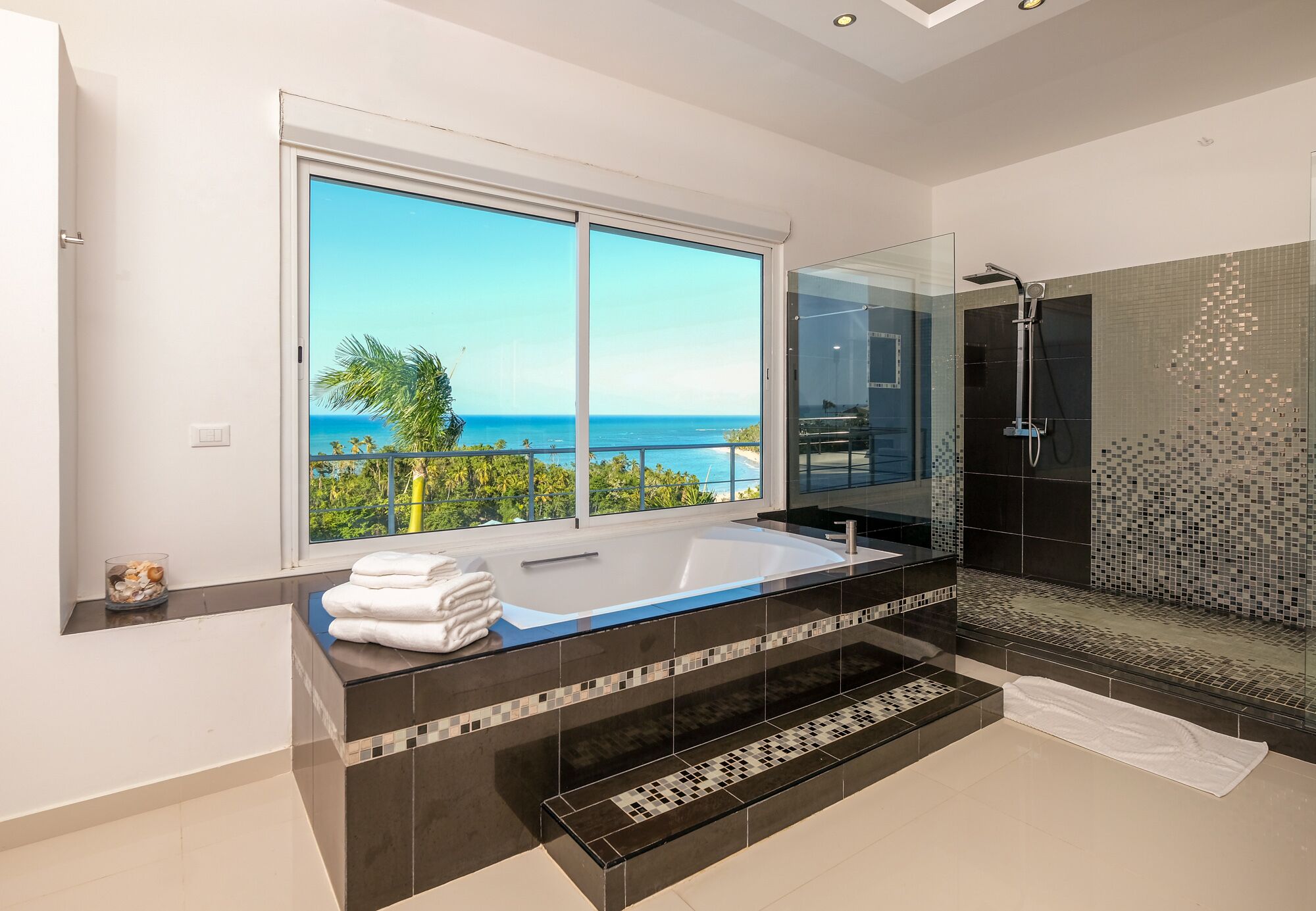 Bathtub, hair dryer, towels, soap