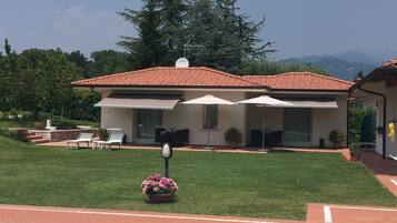 Seasonal outdoor pool, pool umbrellas, pool loungers