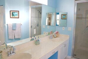 Combined shower/tub, hair dryer, towels, soap - Bright Poolside Retreat – Clean, Cozy & Convenient; Pet Friendly. (Marco Island)