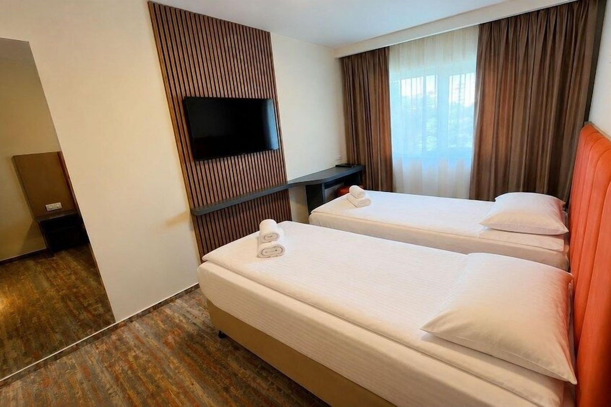 Premium bedding, minibar, desk, laptop workspace