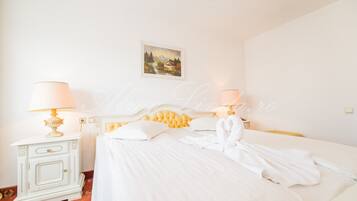Premium bedding, minibar, desk, laptop workspace