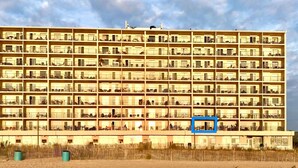 A multi-story hotel with numerous balconies and a beach view. - Flood Damaged - Renovated 2026 ~ Excuse Glitches - Still Quaint VINTAGE Studio (Rehoboth Beach)
