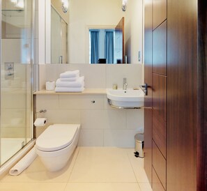 Bathtub, hair dryer, towels, soap