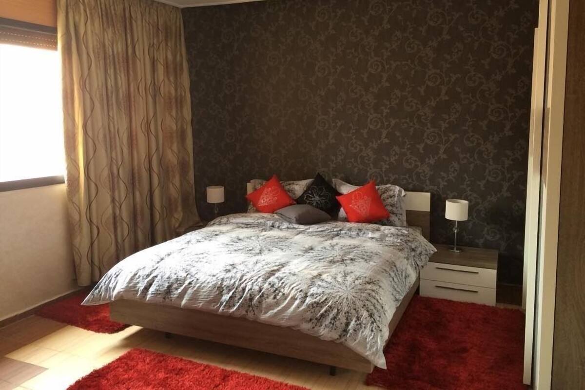 Apartment | Desk, laptop workspace, blackout curtains, iron/ironing board