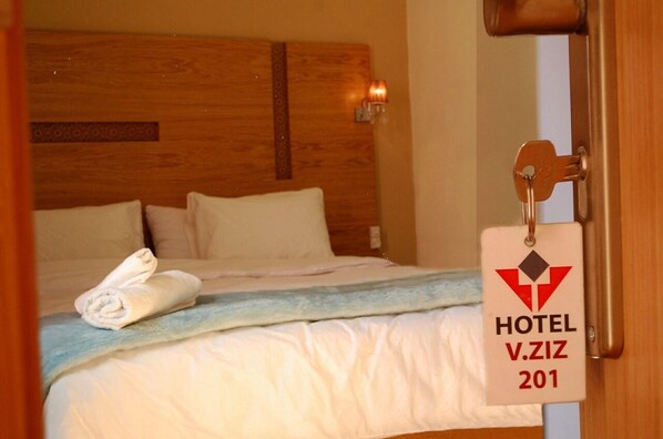 Double or Twin Room | Desk, laptop workspace, blackout curtains, iron/ironing board