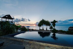 Outdoor pool, pool umbrellas, pool loungers