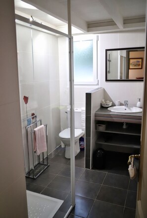 Shower, hair dryer, towels, soap