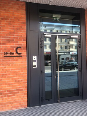 Enter a secure, urban retreat with a keypad lock and control panel.