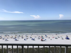 On the beach, sun-loungers, beach towels