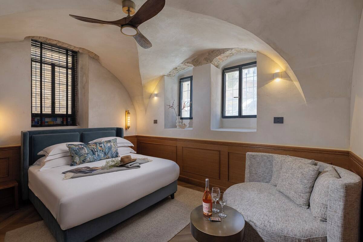 economy double room (the cave) | 1 bedroom, premium bedding, minibar, individually decorated