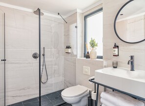 Deluxe Suite, Balcony | Premium bedding, minibar, individually decorated, desk