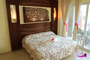 Deluxe Suite, 1 King Bed, Pool View | 1 bedroom, desk, bed sheets, wheelchair access - VILLAS DULCE SUEÑOS (Rincón de Guayabitos)