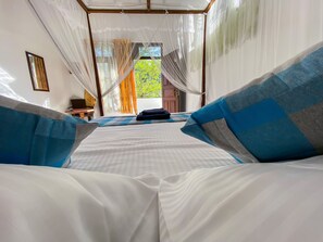 Premium bedding, desk, laptop workspace, blackout curtains