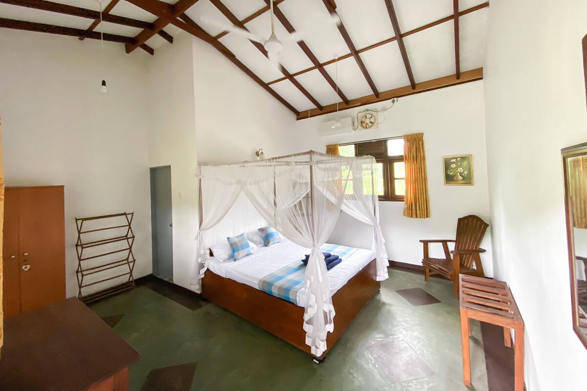 Premium bedding, desk, laptop workspace, blackout curtains