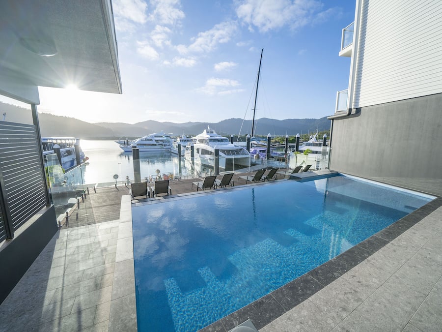 Outdoor pool, a heated pool, open 6:00 AM to 10:00 PM, sun loungers