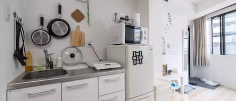 Apartment 201 | Private kitchenette | Mini-fridge, microwave, stovetop, electric kettle