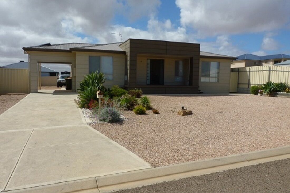 PEBBLES PARADISE is a 4 bed 2 bath modern home  a couple minutes from the beach.