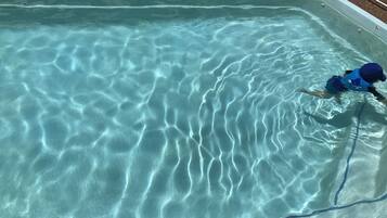 Outdoor pool, open 6:00 AM to 11:00 PM, free cabanas, pool umbrellas
