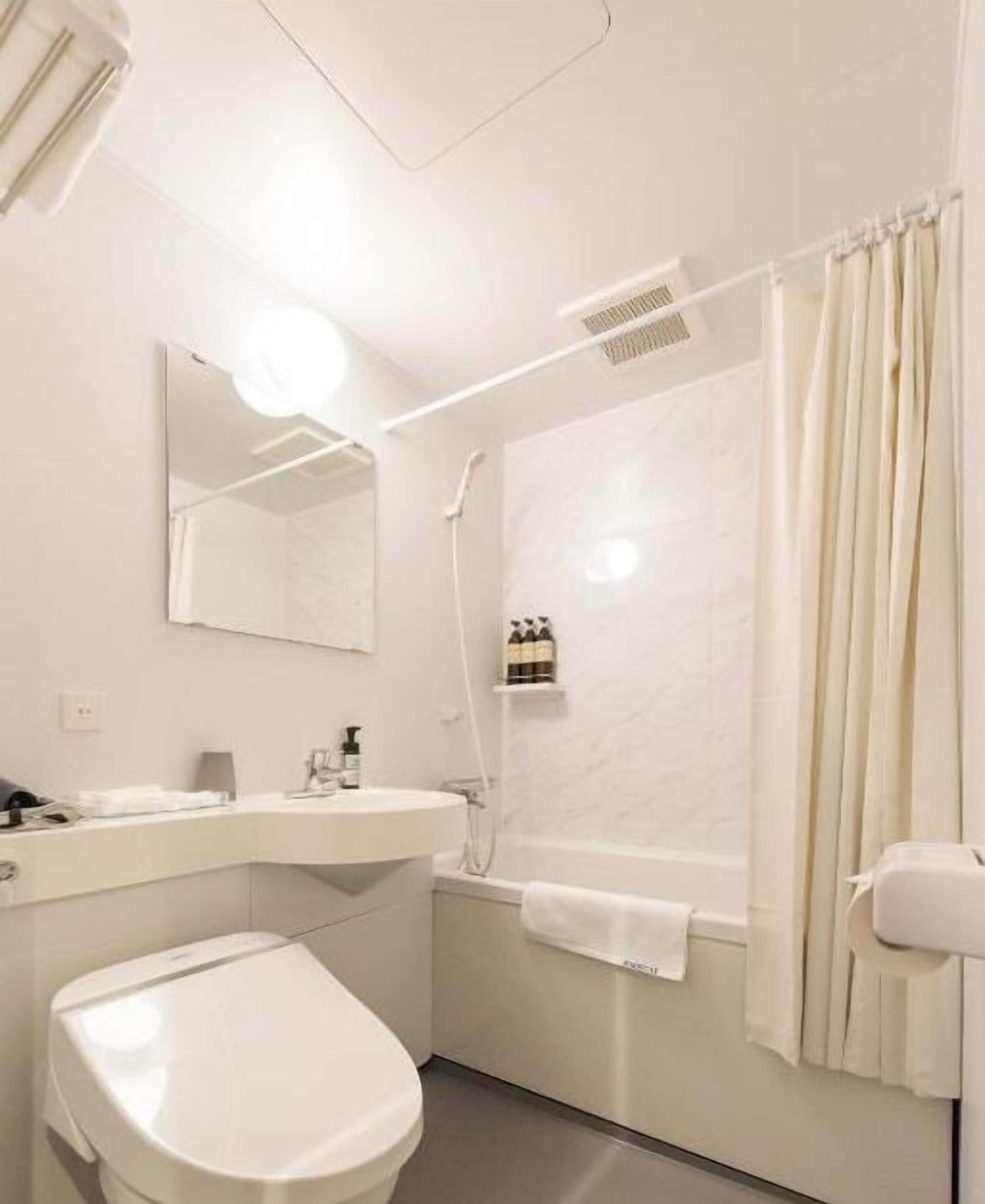 shower, free toiletries, hair dryer, slippers