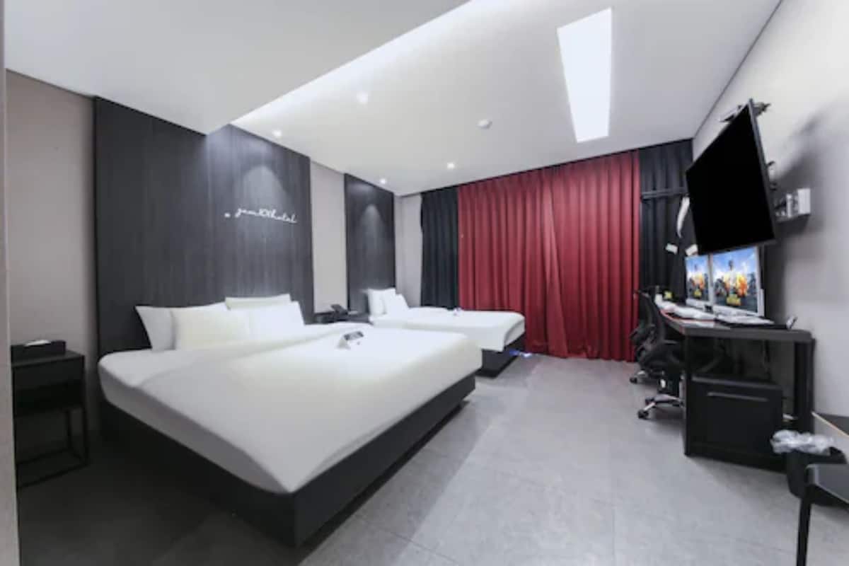 Chambre Familiale avec lits jumeaux