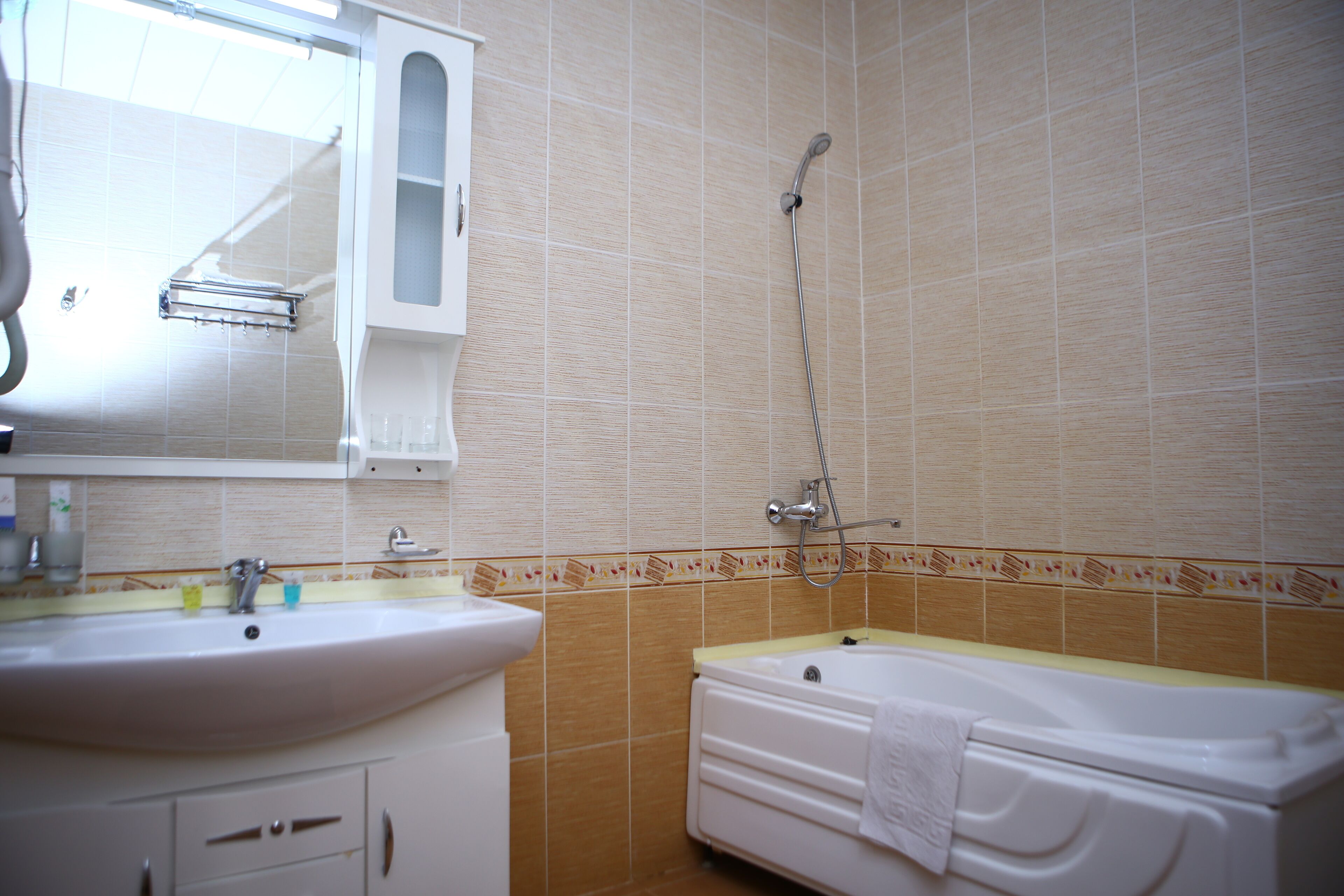classic double or twin room | bathroom | rainfall showerhead, free toiletries, hair dryer, bathrobes