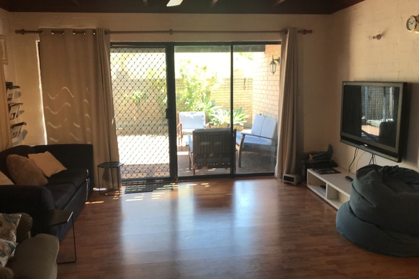 Large living area leading to private courtyard