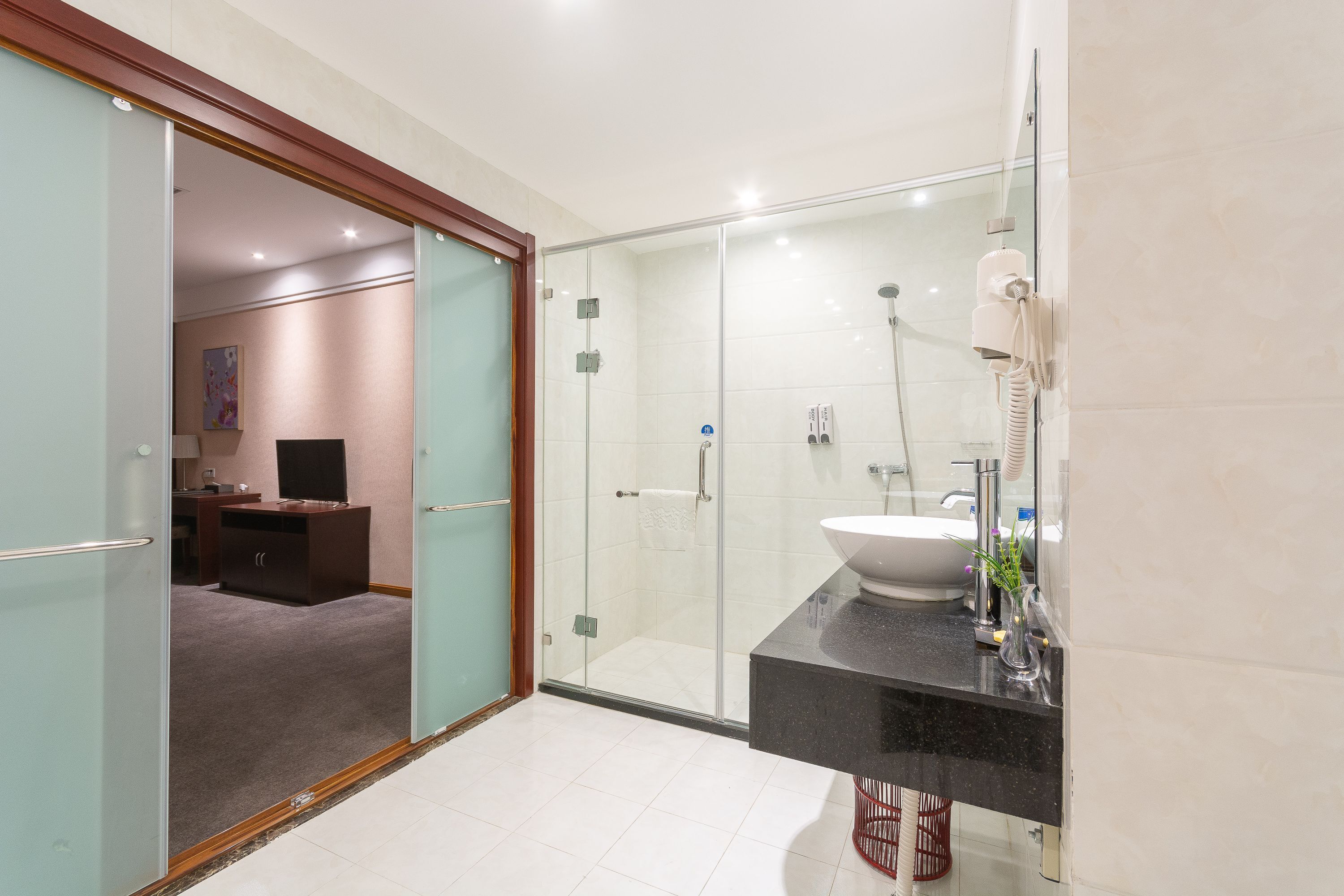 shower, free toiletries, hair dryer, slippers