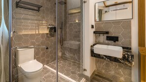 Shower, free toiletries, hair dryer, slippers