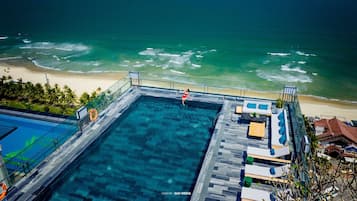 Outdoor pool, open 6:00 AM to 9:00 PM, pool umbrellas, pool loungers