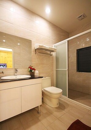 Shower, free toiletries, hair dryer, slippers