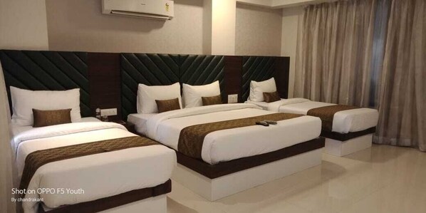 Platinum Family Room | Individually decorated, individually furnished, blackout curtains - Hotel Seven Sky (Nashik)