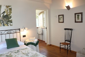 Habitación clásica con 1 cama matrimonial o 2 individuales | Ropa de cama de alta calidad y decoración personalizada