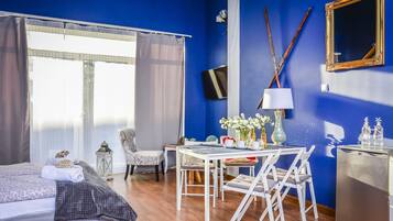 Appartement Supérieur, sauna | Coin séjour | Télévision à écran plat