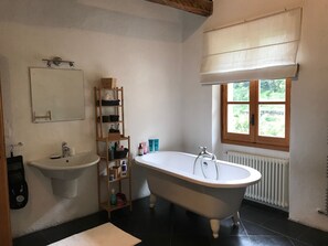 Bidet, towels, soap, toilet paper