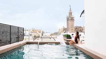 Enjoy a refreshing swim with a stunning view of the historic landmark in the background.