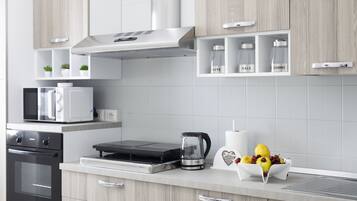 Apartment, 2 Bedrooms | Private kitchen | Full-sized fridge, microwave, oven, stovetop