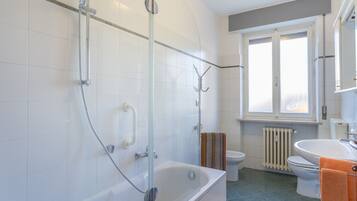 Apartment, 1 Bedroom | Bathroom | Shower, rainfall showerhead, hair dryer, bidet