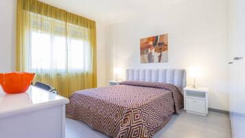 Apartment, 1 Bedroom | 1 bedroom, laptop workspace, iron/ironing board, free WiFi