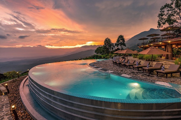 Outdoor pool, open 7:00 AM to 9:00 PM, pool umbrellas, pool loungers