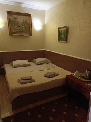 Blackout drapes, iron/ironing board, free WiFi, bed sheets