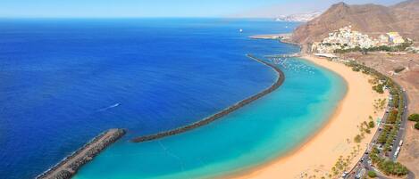 Beach nearby, sun loungers, beach towels
