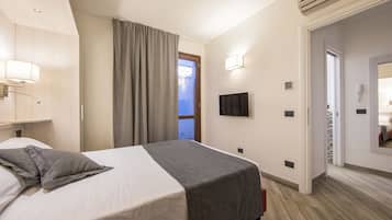 Deluxe Apartment | 1 bedroom, down comforters, in-room safe, blackout drapes