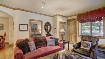 Condo, 2 Bedrooms | Living room | Flat-screen TV