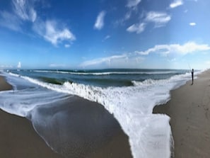 On the beach, sun loungers, beach towels