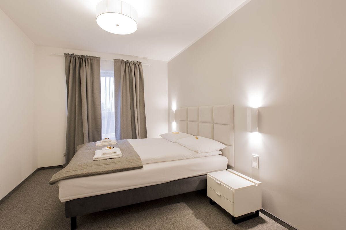 Departamento Confort, balcón | 1 habitación, tabla de planchar con plancha, wifi gratis y ropa de cama